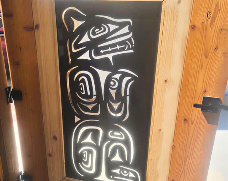 Wooden door with decorative panel and clean professional paint finish